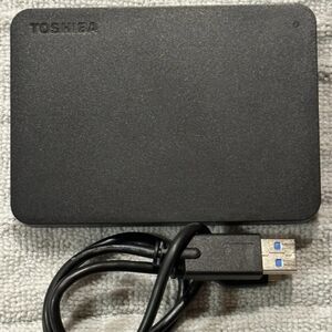2 TB Toshiba Canvio  External Hard Drive. S/N 59EFT1HLTRRG obo.